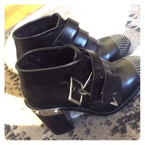 Black and gold boots